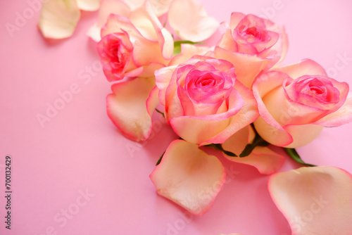 Beautiful pink floral background. Rose flowers and petals composition background for Mother's day, Women's day, wedding day and Valentine's day.  © Lala