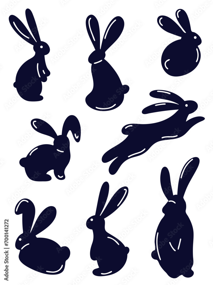 The silhouette of rabbits with long ears. Easter bunnies and bunnies in different movement poses. Jumping hare, sitting hare, lying hare