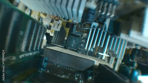 Electronic boards with many different microcircuits and other radio components show the complexity of the products of the modern electronics industry. Closeup. Macro. Shallow depth of field. Shot in m