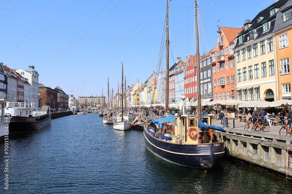 Colourful facade and old ships along the Nyhavn Canal, Copenhagen, Denmark