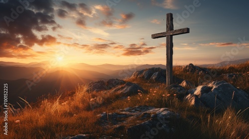 Holy christian religious cross at sunrise on top of hill crucifix photo