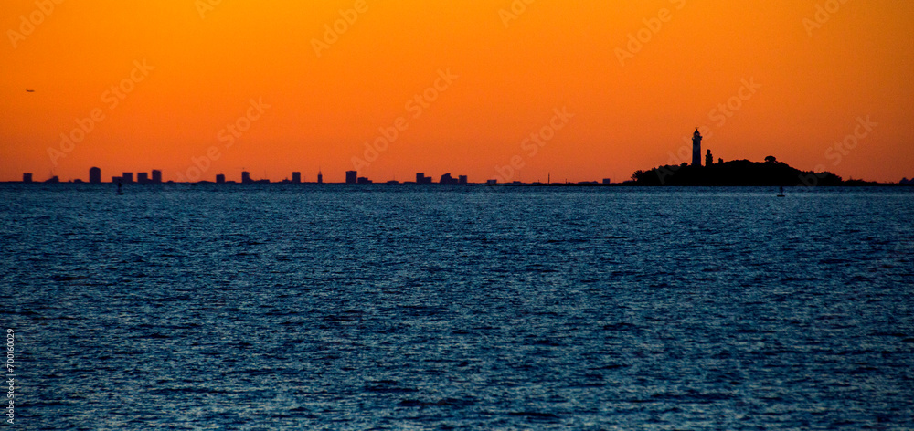 Skyline of Buenos Aires city, as seen from Colonia Del Sacramento, Uruguay. Skyline of Buenos Aires city, as seen from Colonia Del Sacramento, Uruguay.