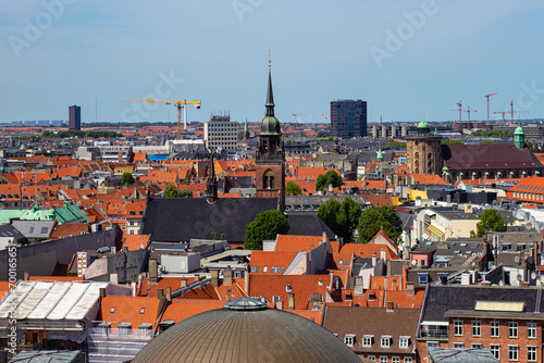 The Church of the Holy Spirit (Danish: Helligåndskirken) and the Round Tower (Danish: Rundetaarn). Aerial view of downtown of Copenhagen from the observation deck of Christiansborg Slot Palace. photo