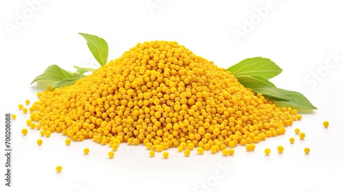 Pile of mustard seeds isolated on white background photo