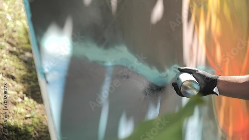Spray painting on canva photo
