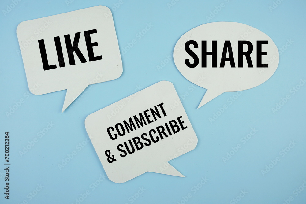 Social media concept with Like, Share, Comment & Subscirbe text message on buble speech on blue background Social media concept with Like, Share, Comment & Subscirbe text message on buble speech on blue background