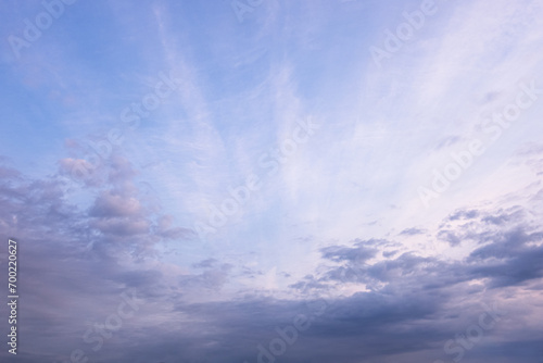 abstract background of dramatic cloudy sunset sky blue hour © Mariia