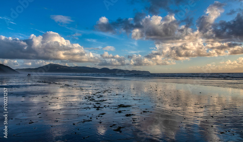 Clouds reflection on beach © James Sakaguchi