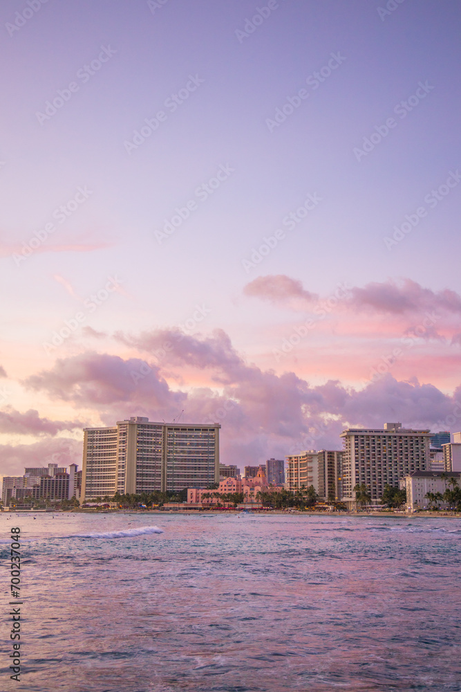 Purple sunset Waikiki beach skyline Hawaii