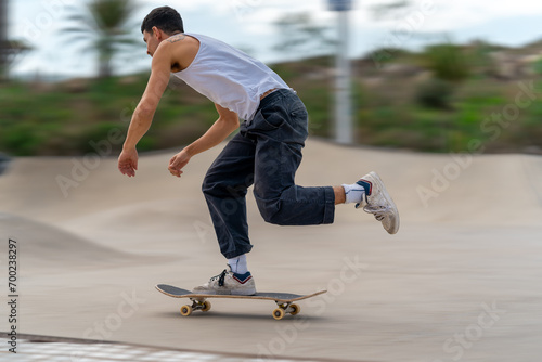 young man skating in a skate park