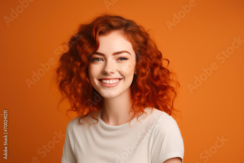 Joyful Redhead Radiating Happiness in Studio Light