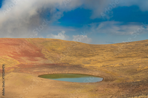 A volcanic lake next to Azhdahak volcano in Gegham mountains, Armenia
