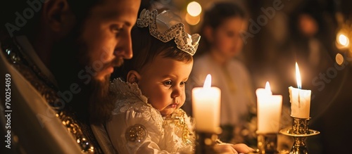 Orthodox christening with three candles photo