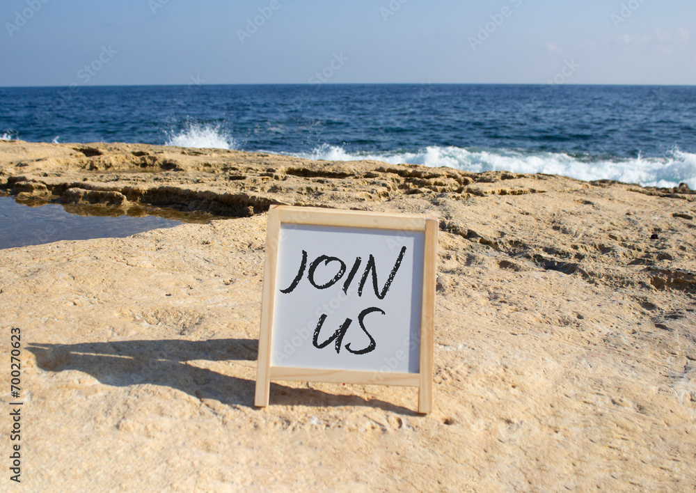 Join us symbol. Concept word Join us on white chalk background. Beautiful sea background. Business and Join us concept. Copy space