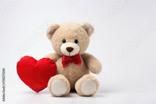 cute teddy bear with a red heart, a symbol of love. Traditional gift for Valentine's Day on February 14