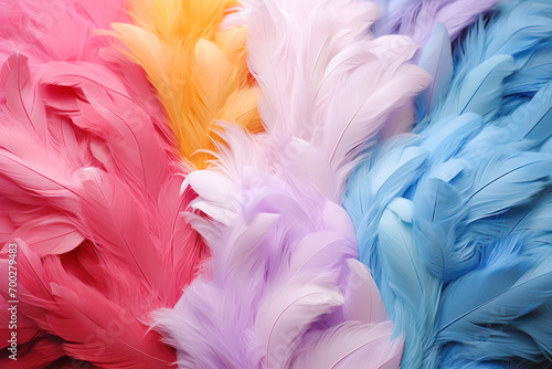 Beautiful background with pastel colored colorful feathers.