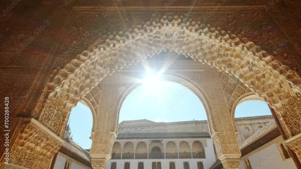 The Alhambra Palace - The Court of the Myrtles, also known as Patio de los Arrayanes, in Comares Nasrid Palace, Granada Anadalucia, Spain The Alhambra Palace - The Court of the Myrtles, also known as Patio de los Arrayanes, in Comares Nasrid Palace, Granada Anadalucia, Spain
