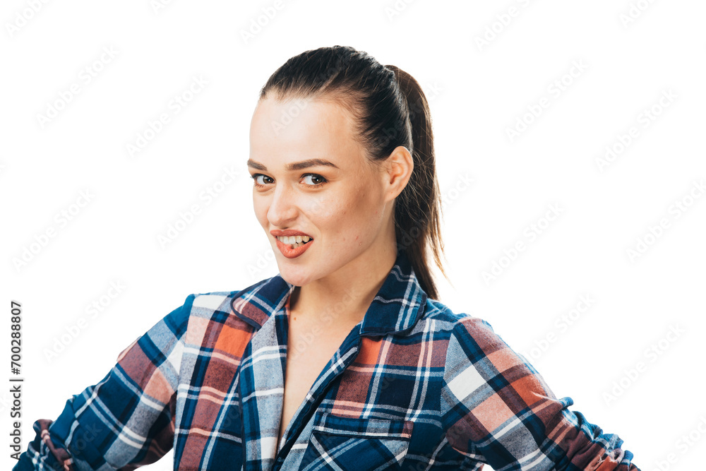 A Stylish Woman Poses for a Picture. A woman in a plaid shirt posing for a picture A Stylish Woman Poses for a Picture. A woman in a plaid shirt posing for a picture