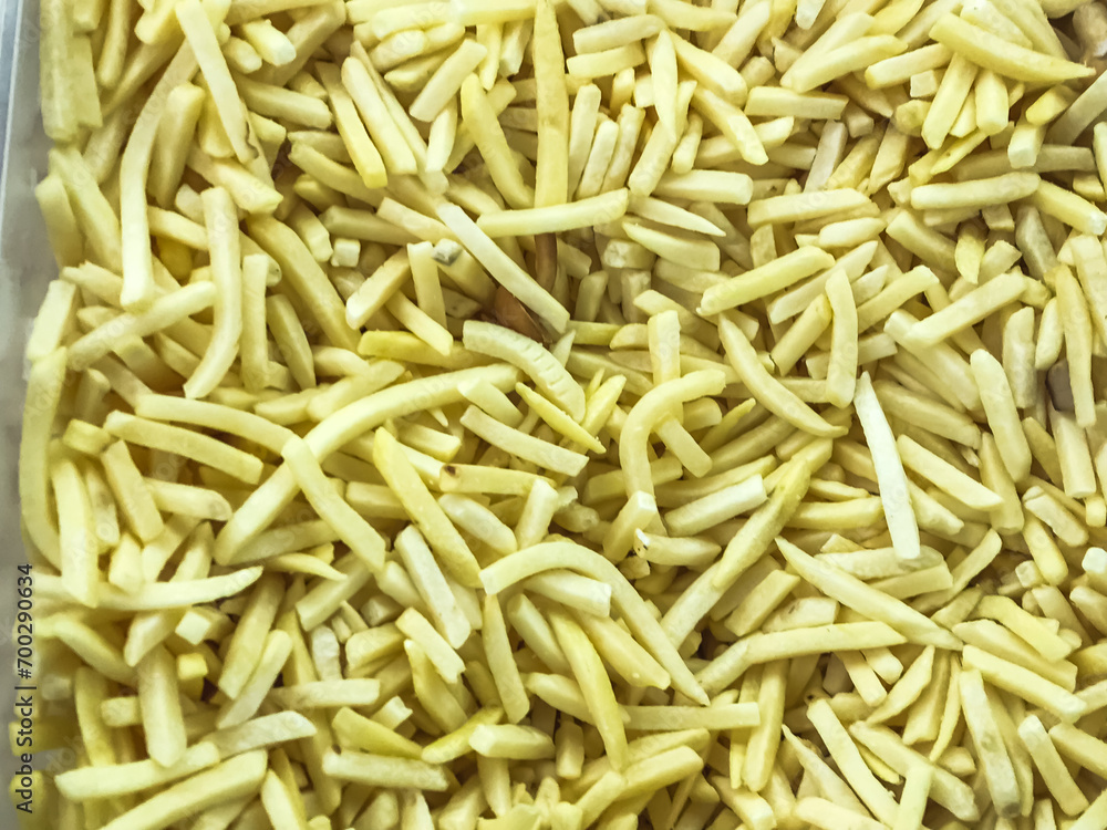 Fries French Frozen , vegetable for food frozen, lying in the refrigerator in supermarket. concept ingredient fast food Fries French Frozen , vegetable for food frozen, lying in the refrigerator in supermarket. concept ingredient fast food