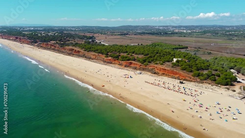 Aerial drone point of view of Falesia Beach. Situated in south of Portugal, Algarve region a famous travel destination. Golden mile beach. beautiful panoramic view of all region.