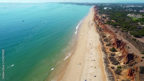 Aerial drone point of view of Falesia Beach. Situated in south of Portugal, Algarve region a famous travel destination. Golden mile beach. beautiful panoramic view of all region.