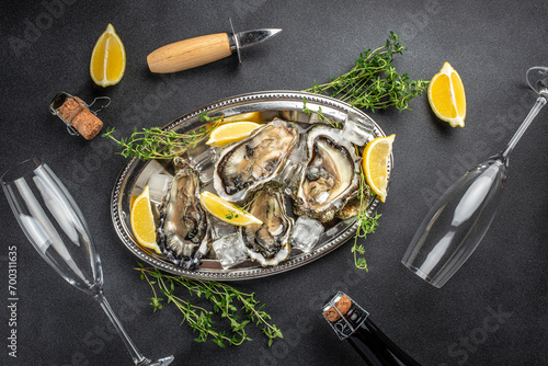 Valokuva Oyster dinner with champagne in restaurant