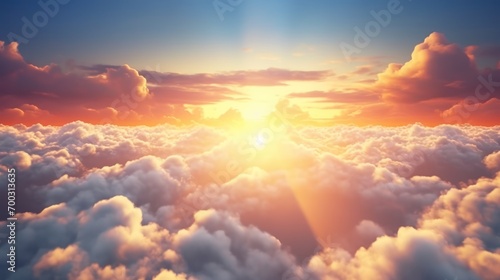  the sun shines brightly through the clouds in this view of the sun setting over the clouds in the sky. © Olga