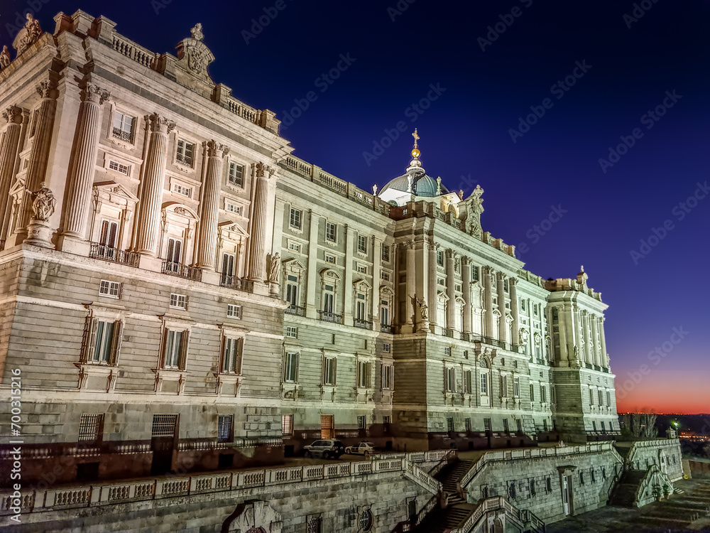 View of the Royal Palace by night in Madrid, Spain
