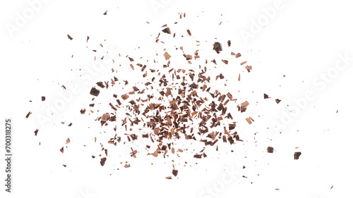 Chopped dark chocolate isolated on white, top view photo