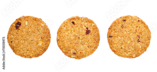 Set round, cereals integral whole wheat biscuit with oatmeal, with cranberry fruit and chopped hazelnut isolated on white, top view