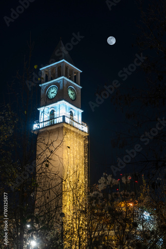 Albania, Tirana city. clock tower decoration with light night light photo