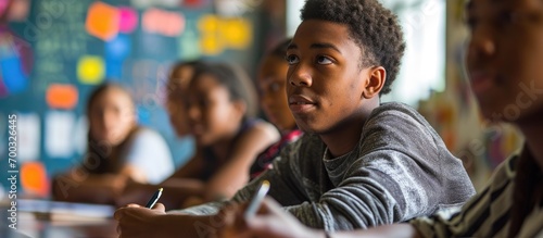 Educator and students in class lesson