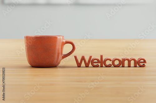 Orange 3D Rendered Coffee Cup on Wood Countertop Welcome Sign