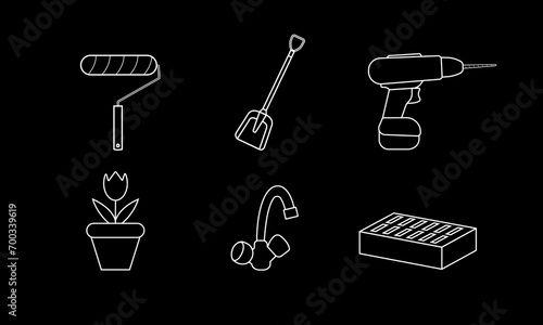 White tools for the house on a black background