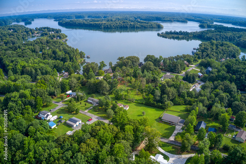 Drone view of beautiful lake and waterfront vacation homes and boat houses on beautiful Tims Ford Lake in Winchester Tennessee