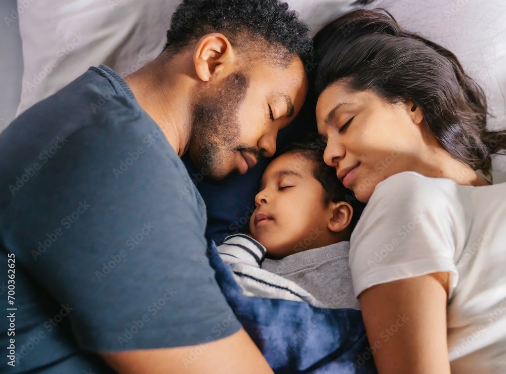 Blended family sleeping together with their child Blended family sleeping together with their child