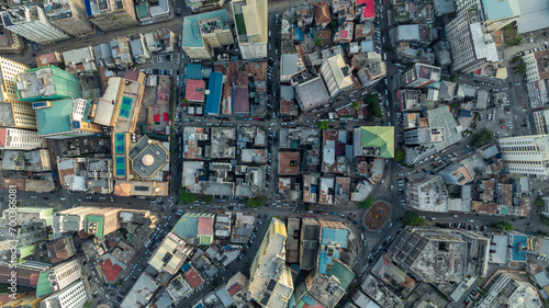 Cityscape of Dar es Salaam at sunset featuring residential and office buildings.