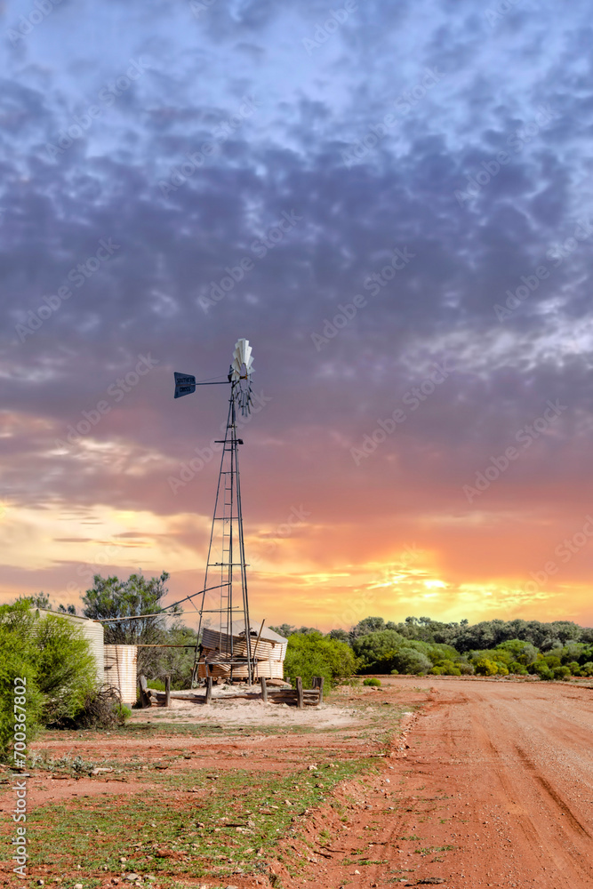 Old windmill at sunset outback Western Australia
