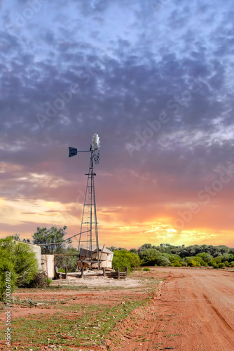 Obraz na płótnie Old windmill at sunset outback Western Australia w salonie
