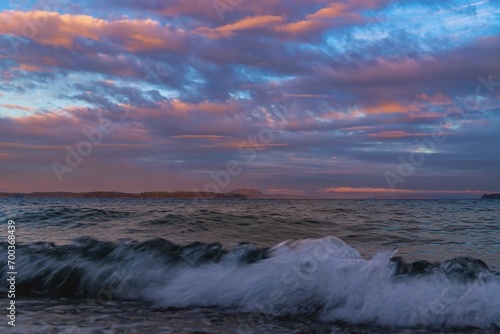 Ocean Waves Crashing At Sunset © Lisa