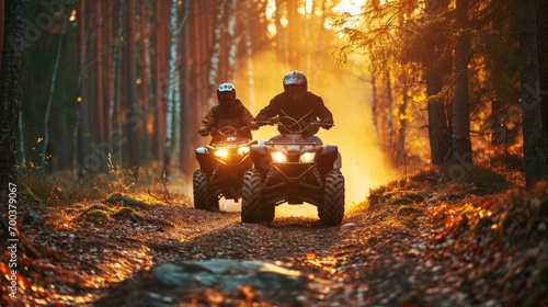 ATV racers take part in speed races in the forest. Concept of the excitement of off-road racing on ATVs in a natural environment