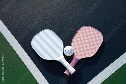 Pickle ball paddle on pickle ball court. photo