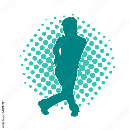 Silhouette of a man in oriental martial art pose. Silhouette of a male in martial art move.
