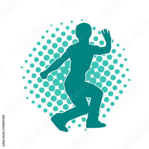 Silhouette of a man in oriental martial art pose. Silhouette of a male in martial art move.