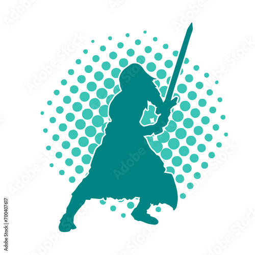 Silhouette of a female warrior in action pose with her sword weapon. Silhouette of a woman fighter in action pose with sharp blade weapon.