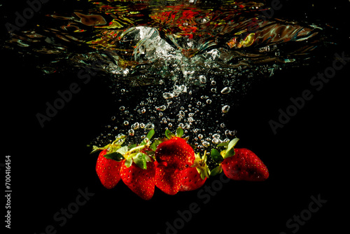 Strawberry Fruit Falling into the water
