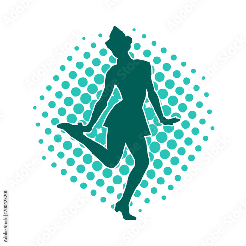 Silhouette of a female dancer in action pose. Silhouette of a woman dancing happily.