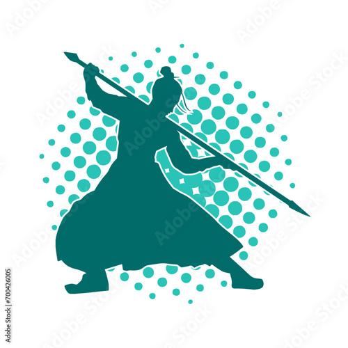 Silhouette of a wushu martial artist in action pose with a spear weapon. Silhouette of a fighter carrying a spear weapon.