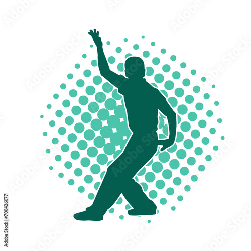 Silhouette of a man in oriental martial art pose. Silhouette of a male in martial art move.