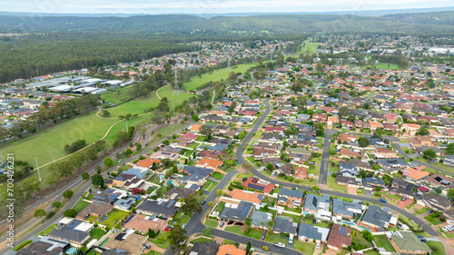 Canvas Print Drone aerial photograph of residential houses and recreational spaces in the sub